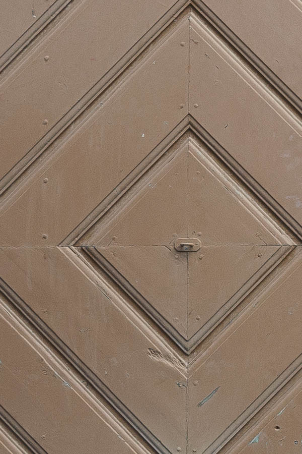 Photo 17991: Formed, light brown double door of diagonally mounted boards
