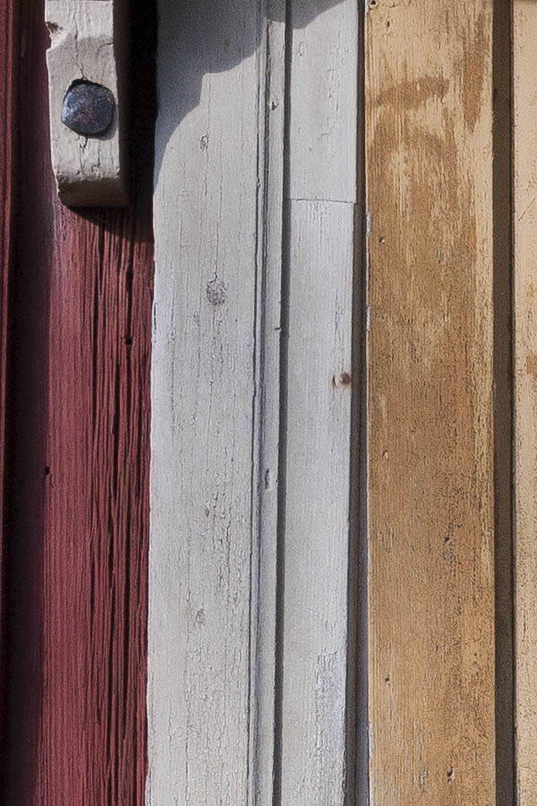 Photo 18057: Panelled, yellow and unpainted door in a grey frame