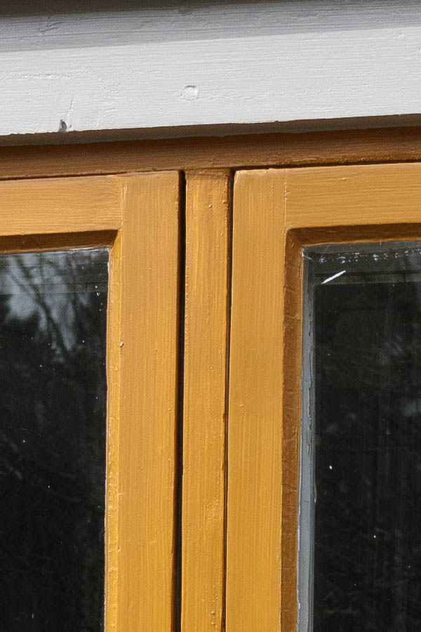 Photo 18161: Yellow window with two frames and four panes in a white frame