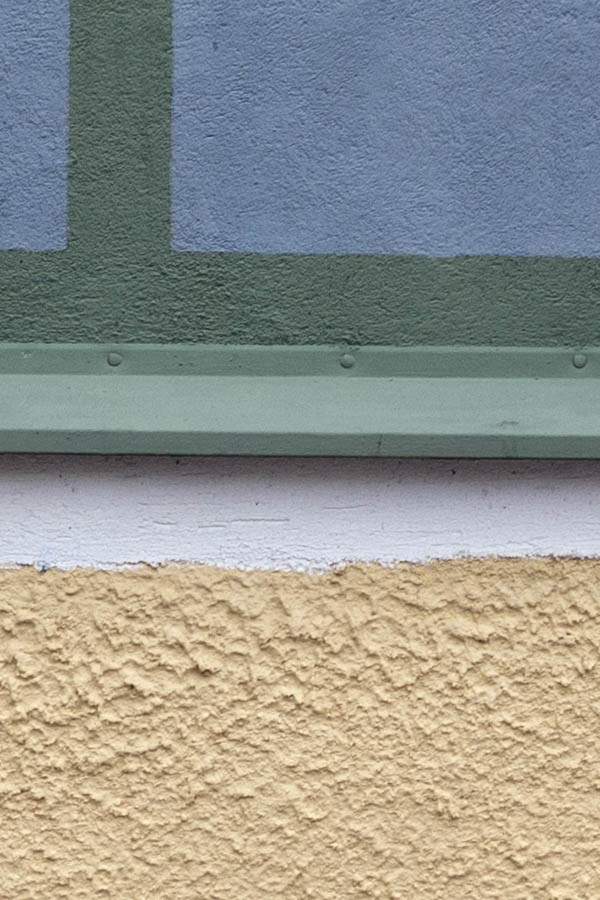 Photo 18277: No window. Painting of a green and white window on a roughcast, yellow wall