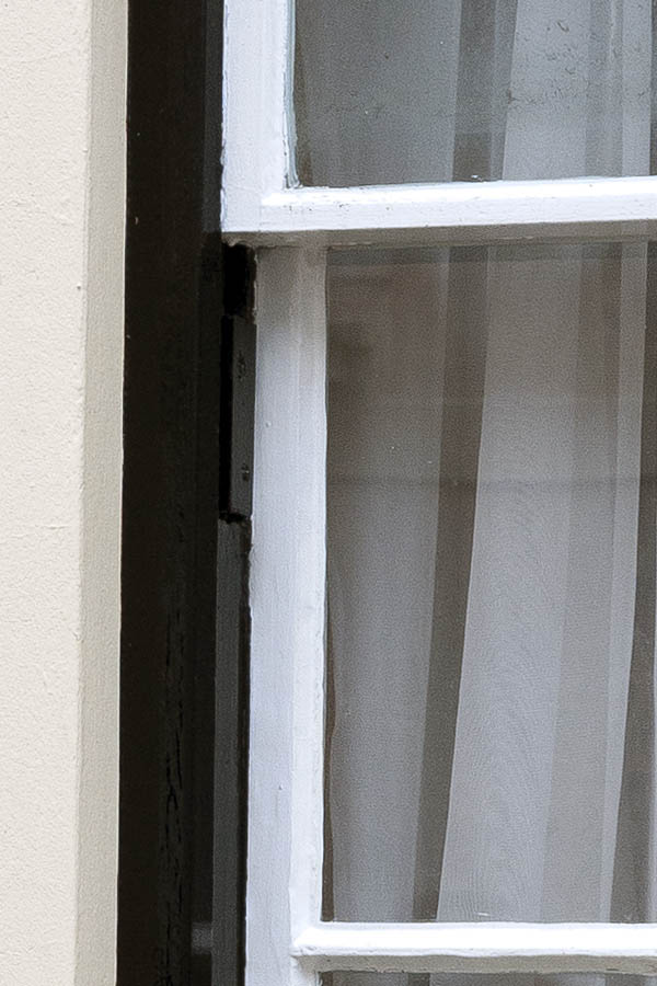 Photo 18807: Sash window with nine white panes in a black frame