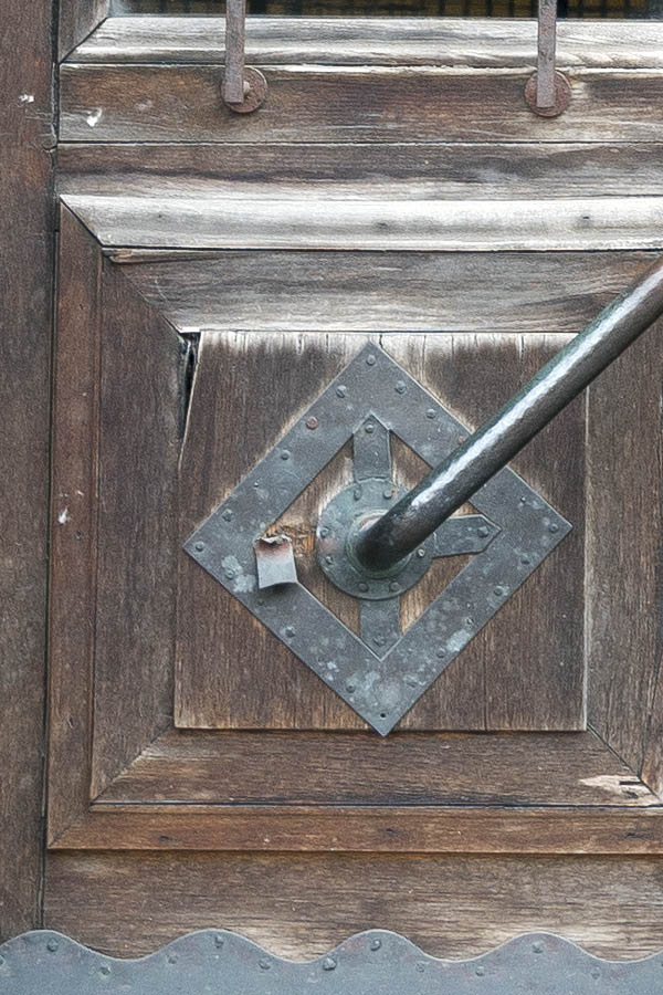 Photo 19086: Worn, panelled, carved, barred, formed, oiled double door with formed top window