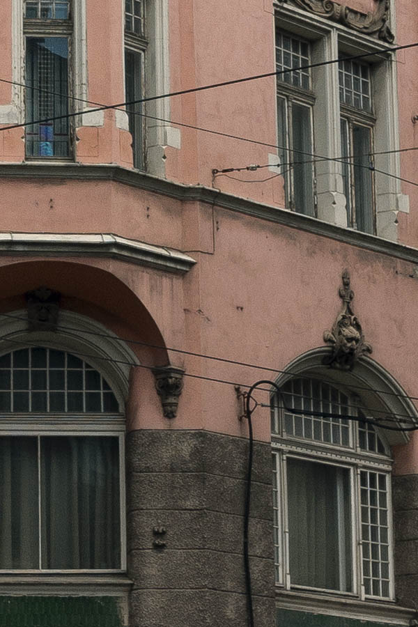 Photo 19088: Facade of large, pink house 