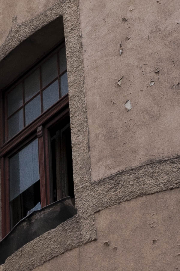 Photo 19136: Facade of large building with brown T-post windows