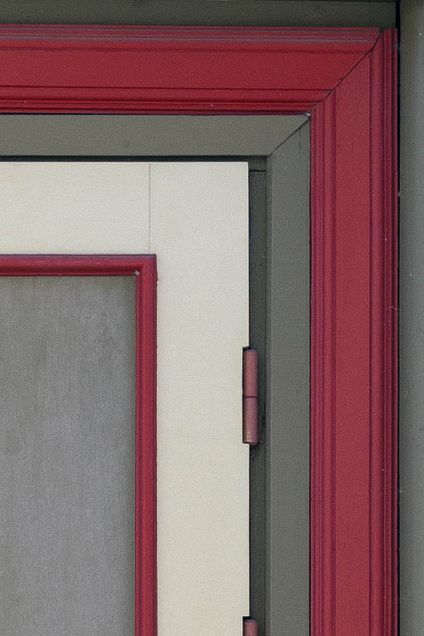 Photo 19923: Lopsided, panelled, brown, red and white door