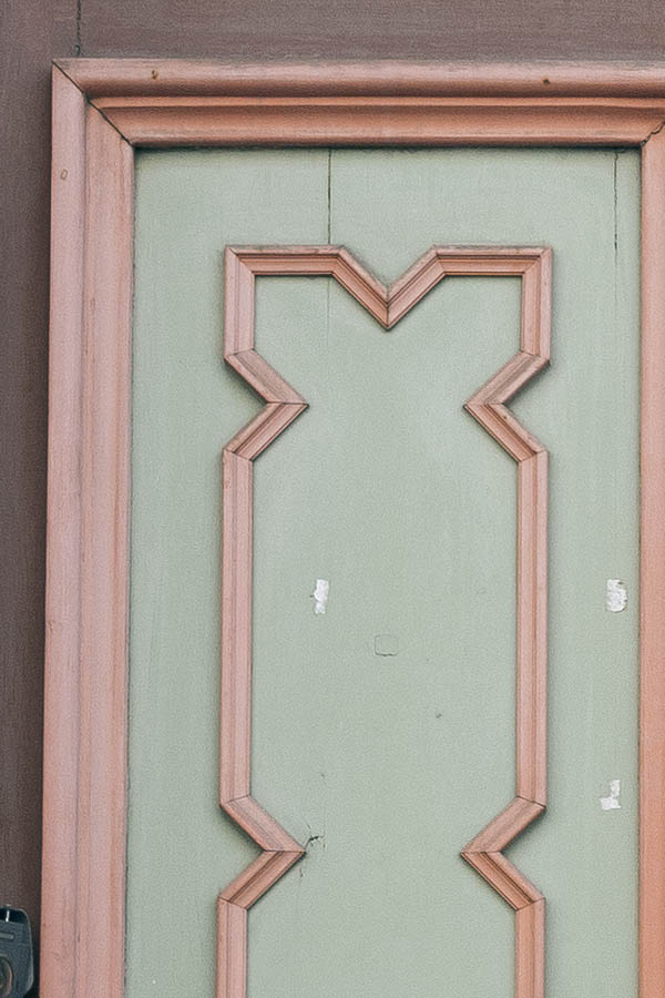 Photo 19976: Worn, carved, panelled, brown, pink and grey double door