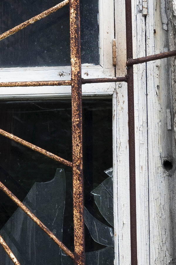 Photo 20076: Worn, white, latticed, formed window with five frames