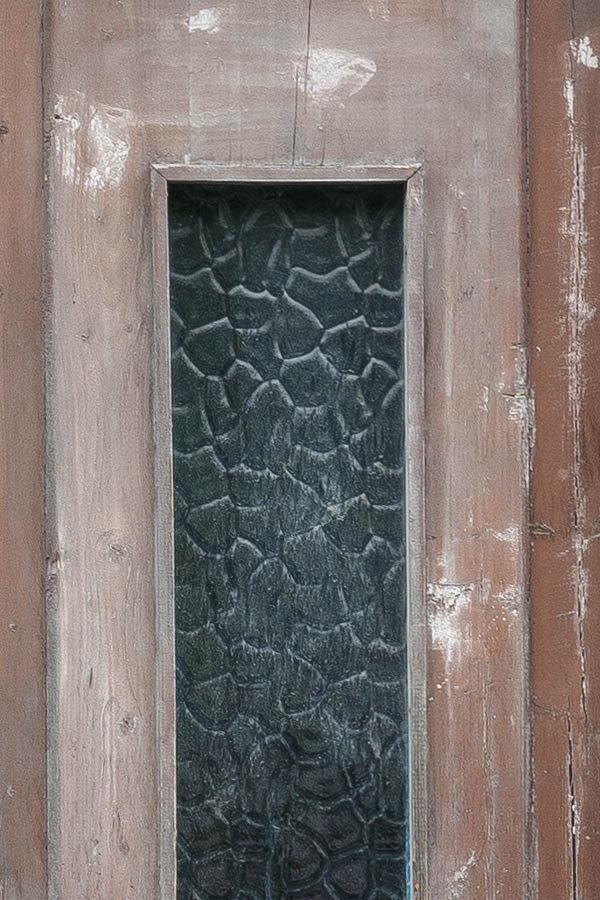 Photo 20114: Worn, panelled, unpainted and brown double door with top window
