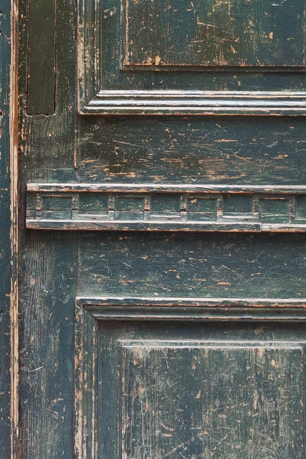 Photo 20172: Worn, panelled, teal double door with top window
