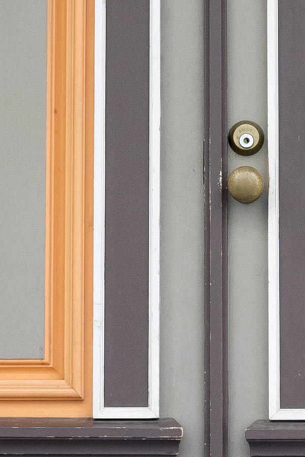 Photo 20215: Panelled, light brown, brown and orange double door with top window