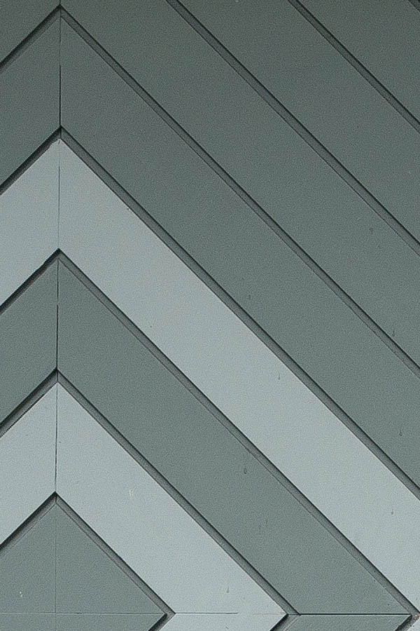 Photo 23880: Green garage door with diamond-shaped pattern