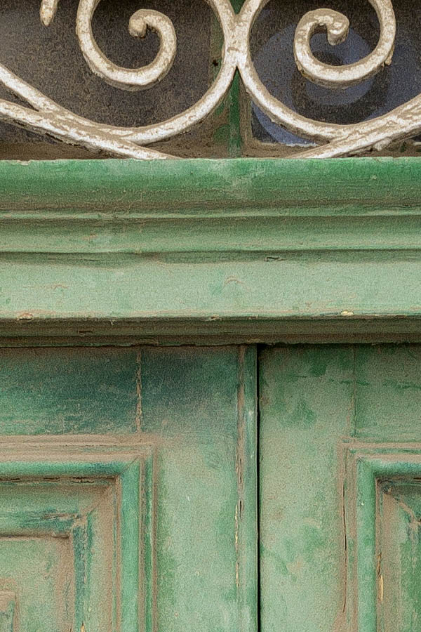 Photo 24069: Worn, panelled, green double door with latticed top window