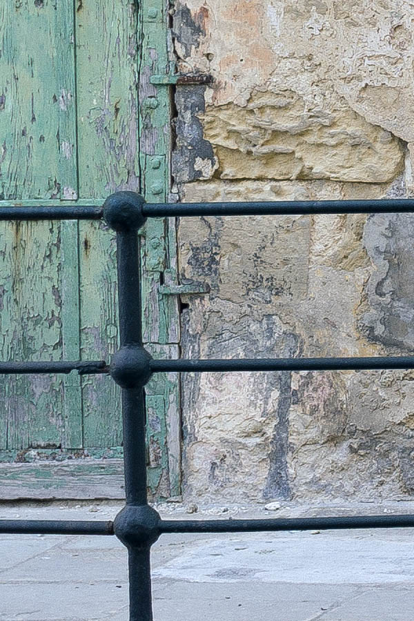 Photo 24080: Facade with two formed, green double doors of planks