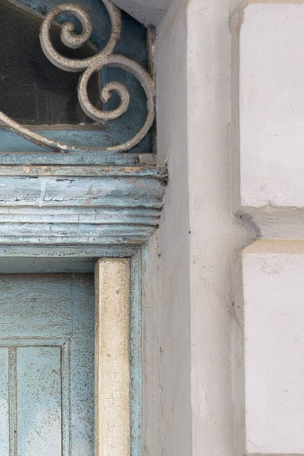 Photo 24089: Worn, narrow, panelled light blue door in four parts with latticed fan light