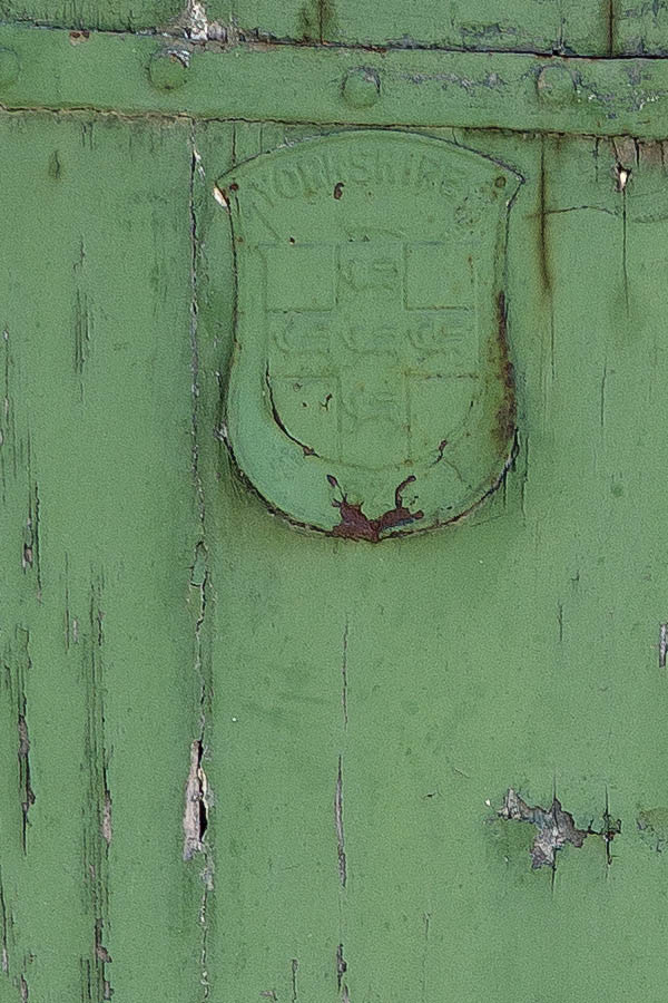 Photo 24168: Worn, formed, green double door of planks