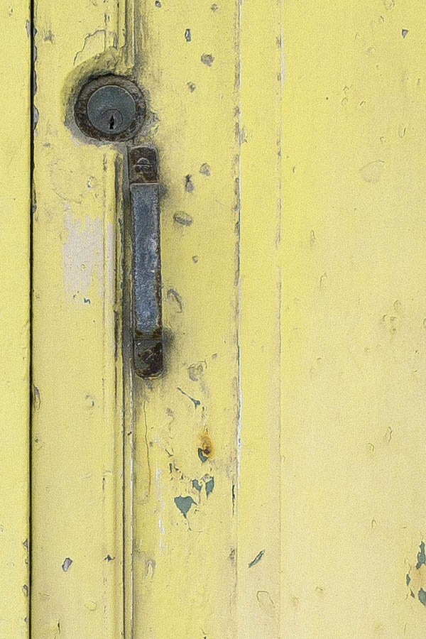 Photo 24292: Worn, panelled, yellow double door