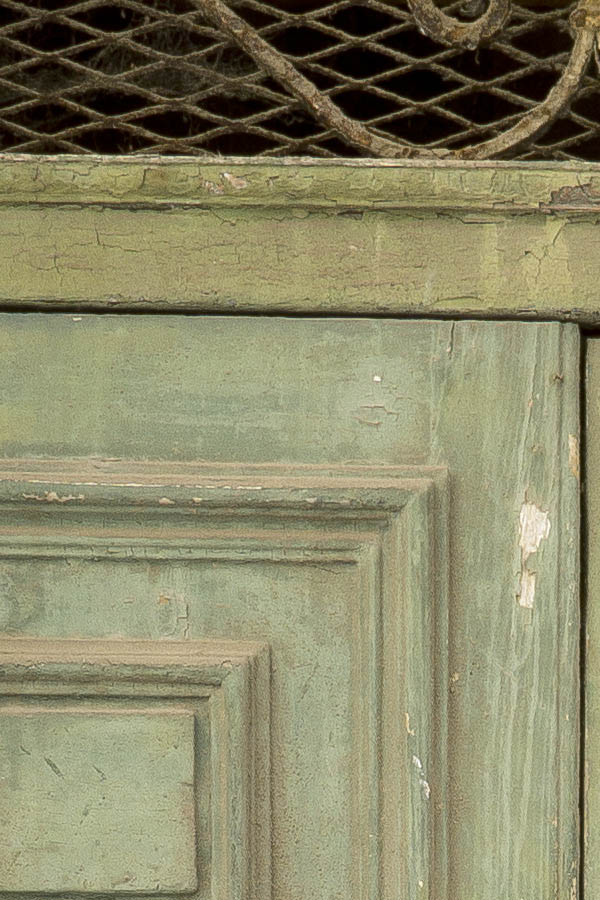 Photo 24293: Worn, panelled, light green double door with latticed top window