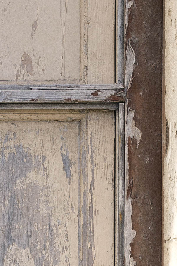 Photo 24412: Decayed, formed, red and unpainted double door with four panes