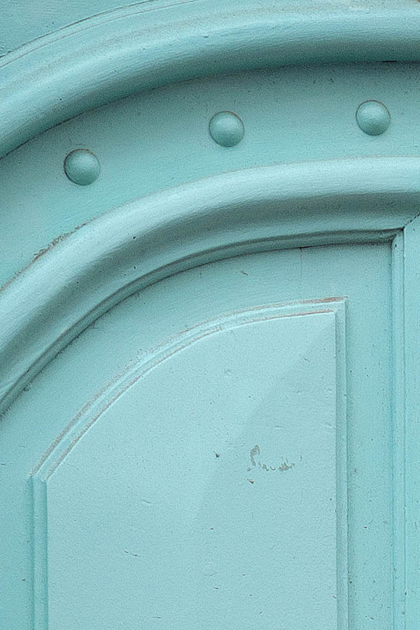 Photo 24520: Panelled, light green double door with nails