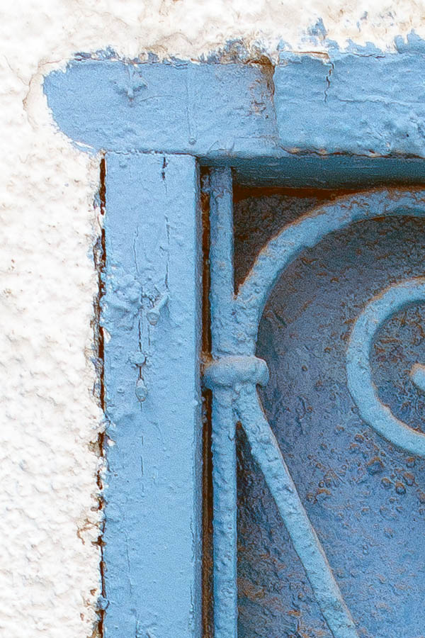 Photo 24526: No window. A latticed, light blue indenture in a roughcasted, white wall
