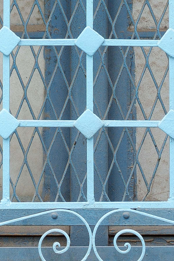 Photo 24549: Light blue window with 12 panes covered by a light blue lattice