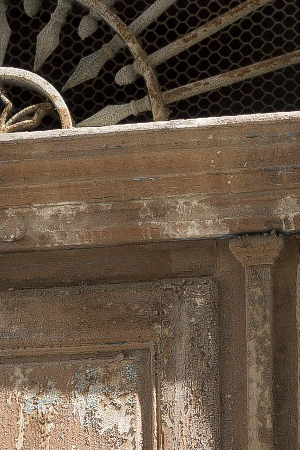 Photo 24576: Decayed, panelled, yellow gate with a large, latticed fan light