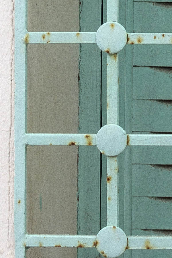 Photo 24603: Barred, carved, light green shutters
