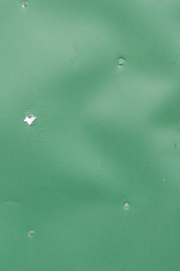 Photo 24650: Formed, green double door of boards covered with metal plate