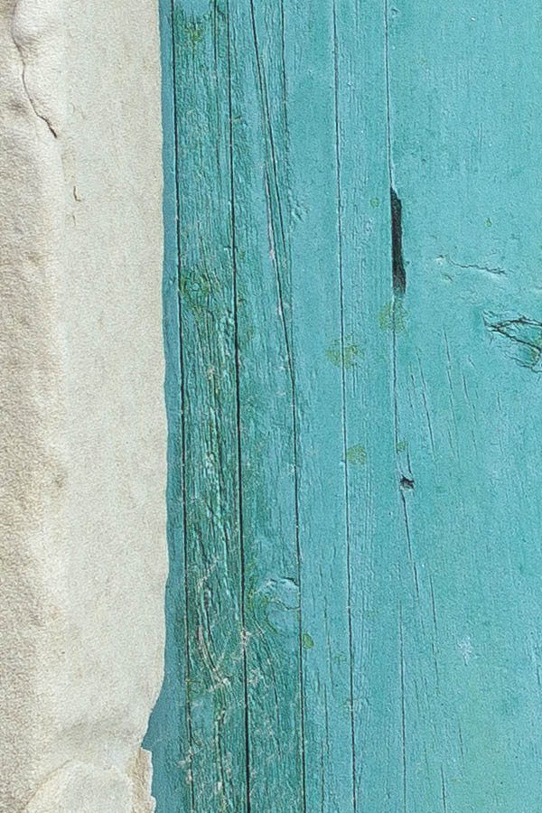 Photo 24652: Worn, formed, light blue double door of boards