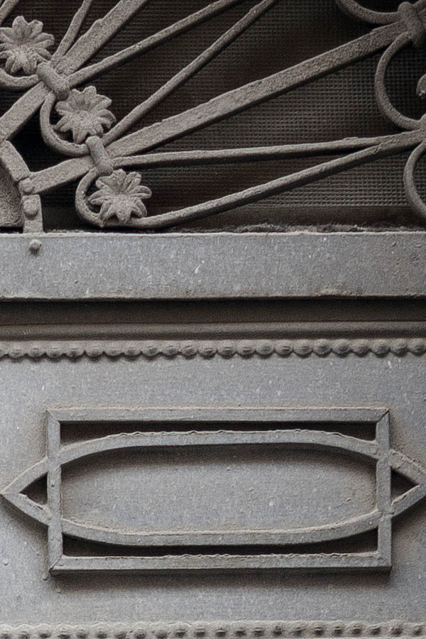Photo 24732: Narrow, panelled, carved, grey double door with latticed fan light
