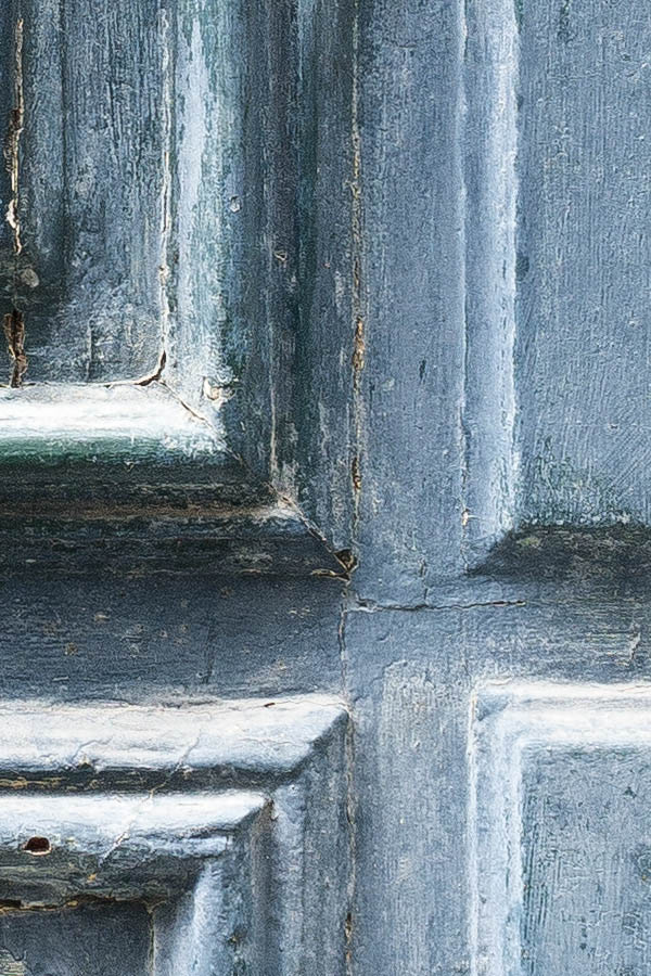 Photo 24781: Worn, carved, panelled, teal door