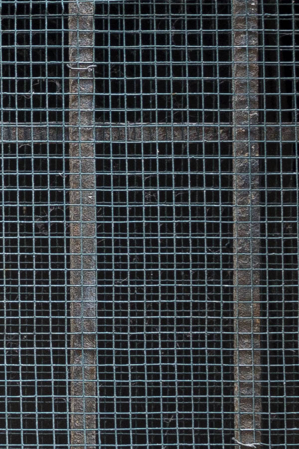 Photo 24785: Latticed, barred, black metal window