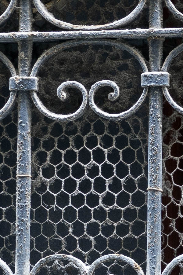 Photo 24848: Latticed, barred, black window
