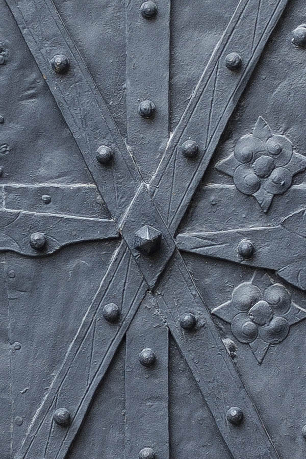 Photo 24993: Worn, black metal plate door