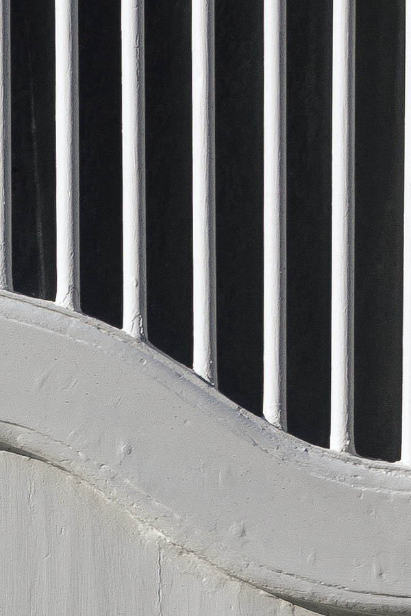 Photo 25028: Formed, panelled, white gate with large, barred door lights