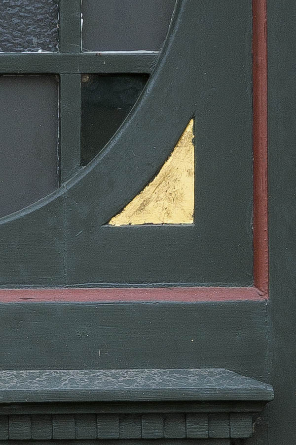 Photo 25062: Panelled, carved, dark green, red and yellow door with formed door light