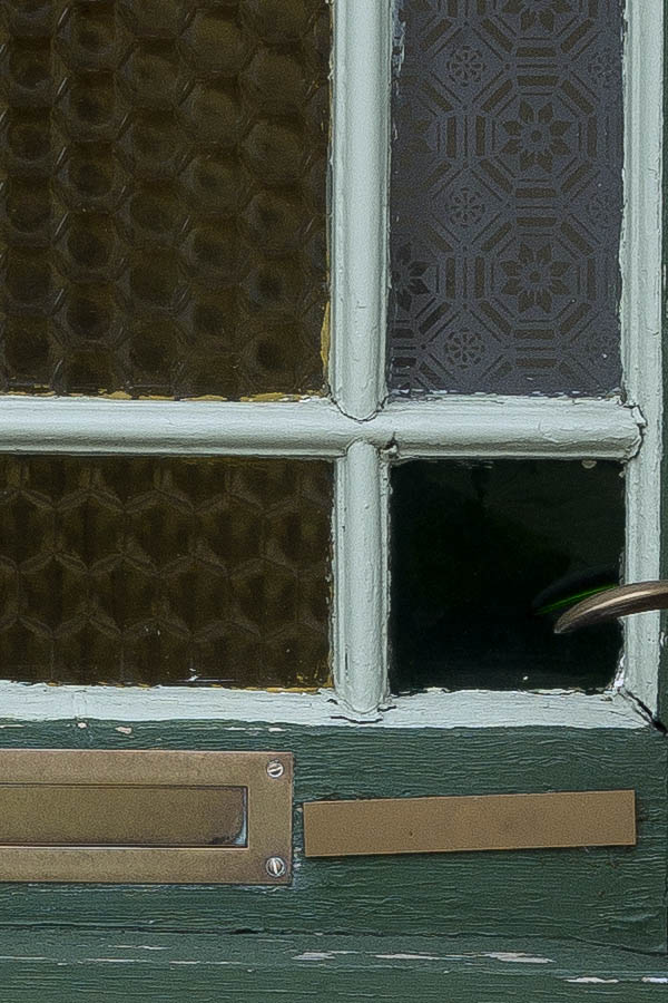 Photo 25068: Worn, panelled, green and light green door with large door light and top window