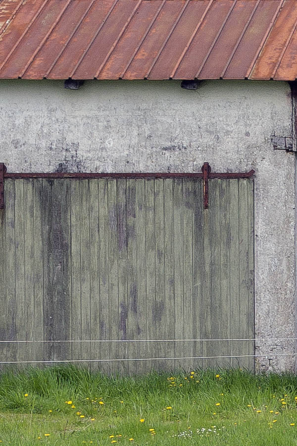 Photo 25175: Facade of white stable and barn with rusty, brown metal roof