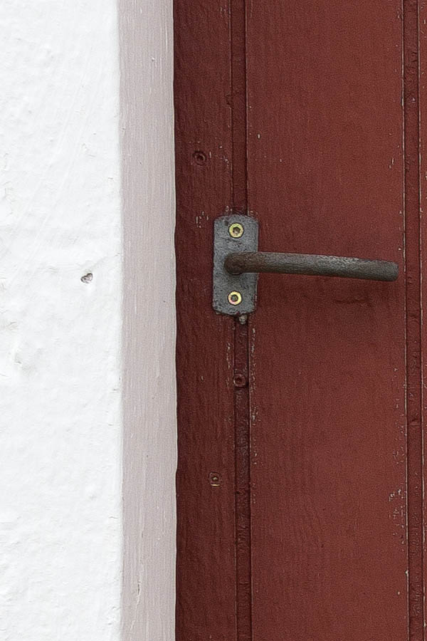 Photo 25187: Worn, red door of boards