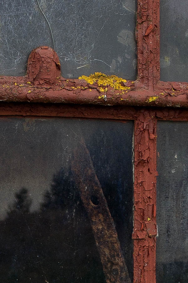 Photo 25190: Formed, rusty, brown metal stable window with two frames and 12 panes