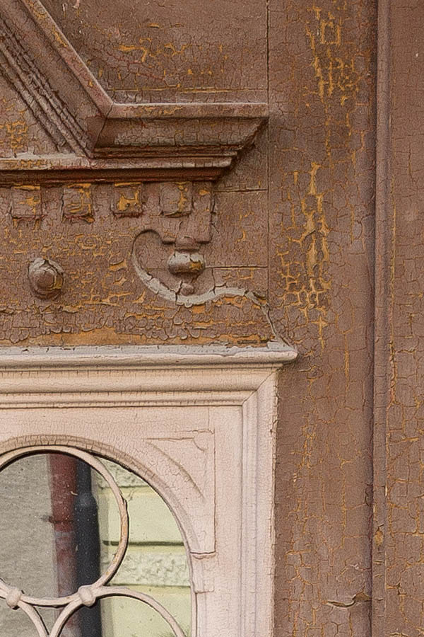 Photo 25380: Worn, formed, panelled, carved, brown and light brown door with latticed door light