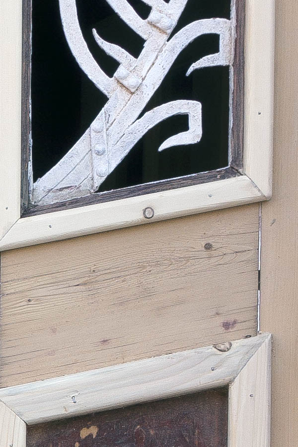 Photo 25639: Formed, carved, panelled, unpainted door with sidepiece