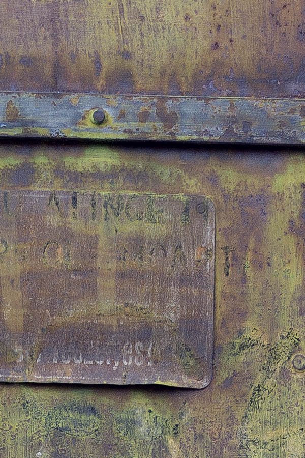 Photo 25756: Worn, rusty, brown metal plate door