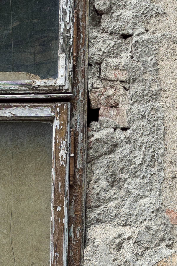 Photo 25759: Facade with two worn, brown and white windows with four frames each