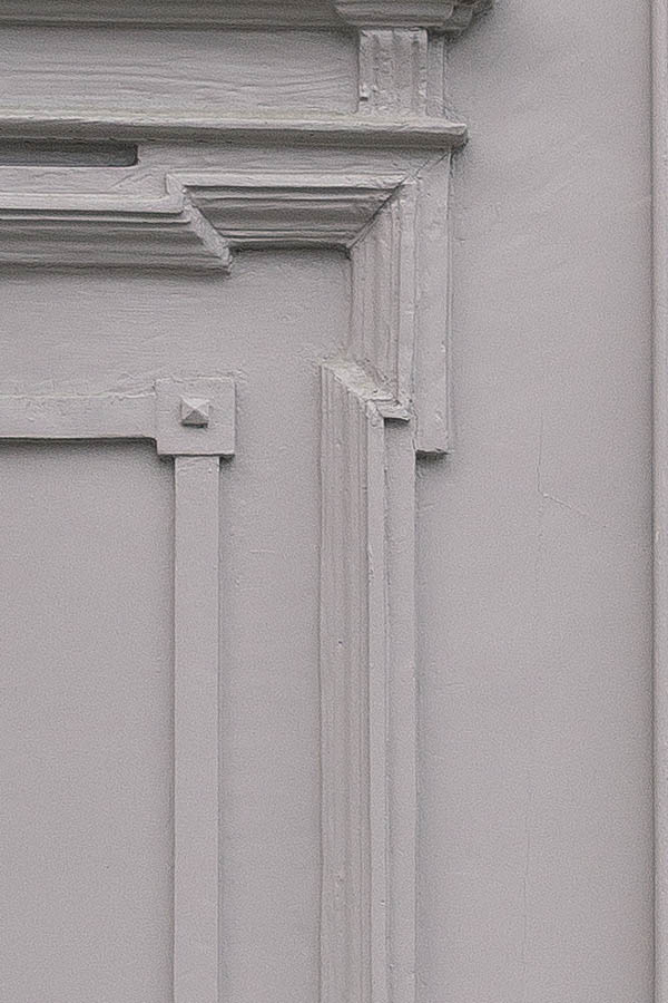 Photo 25790: Panelled, carved, grey gate with top window