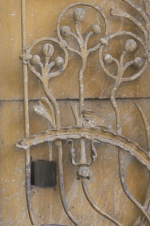 Photo 25865: Worn, formed, panelled, unpainted, brown double door with large, latticed door lights and barred, br