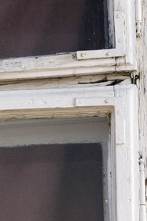 Photo 25951: Worn, white window with four frames and six panes