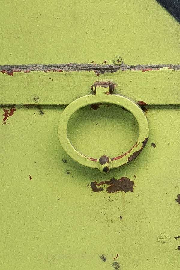 Photo 26062: Panelled, light green metal plate double door with ventholes