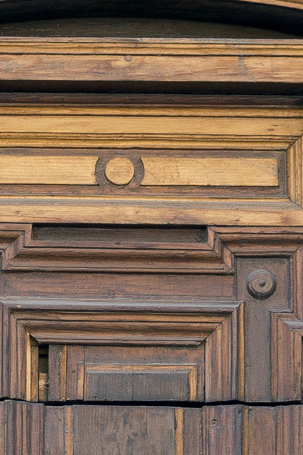 Photo 26088: Worn, panelled, brown and oiled, carved double door with fan light and minor door