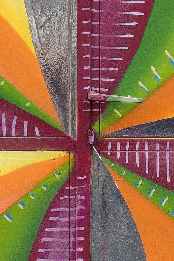 Photo 26153: Metal plate double door with a large graffitti in yellow, orange, green, red, white, blue, and purpl